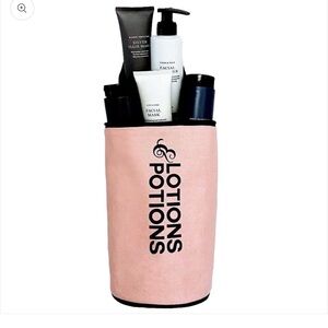 Bag-all LOTIONS and POTIONS pink travel bag.